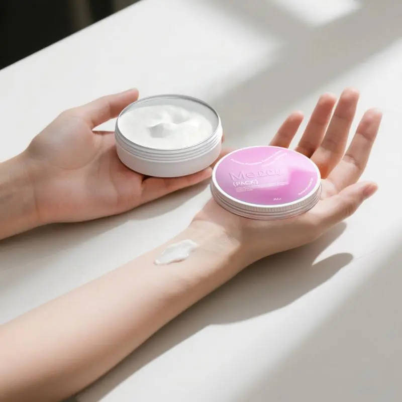 hand testing cream balm in aluminum jar, showing its fine texture for a skincare experience(1).jpg